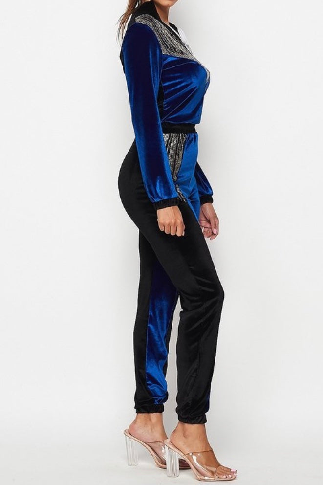 Womens long sleeve jumpsuit with zipper and sequin detail