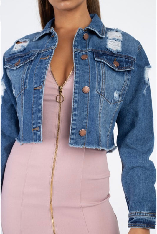 Women’s cropped Medium wash distressed denim jacket