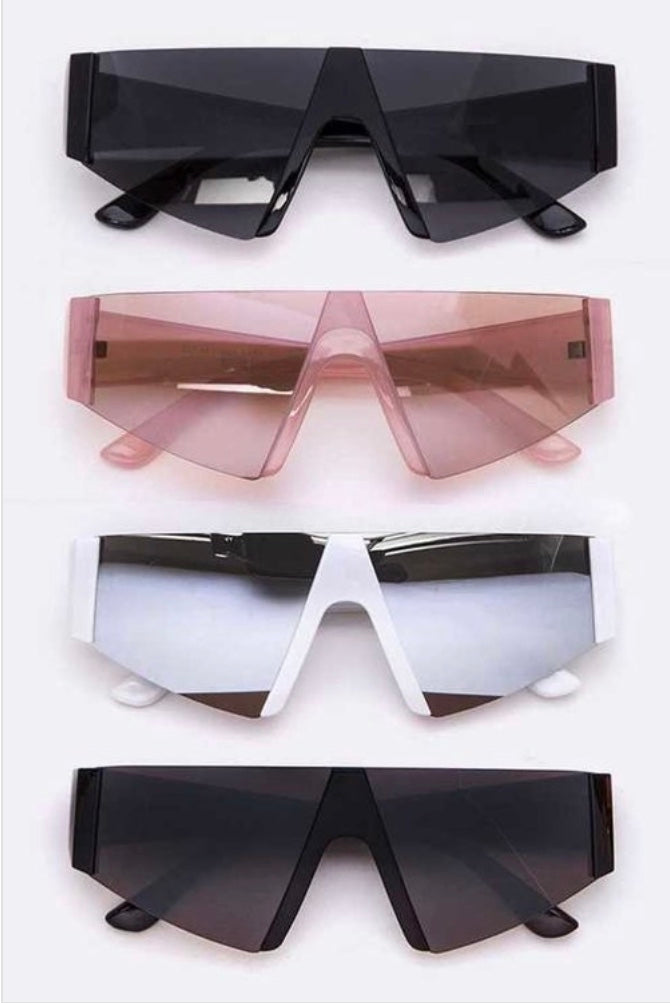 Women’s triangle sunglasses available in pink, white, black, and brown 